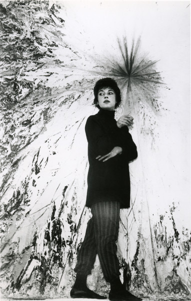 Jay DeFeo in front of an early stage of The Rose, 1961