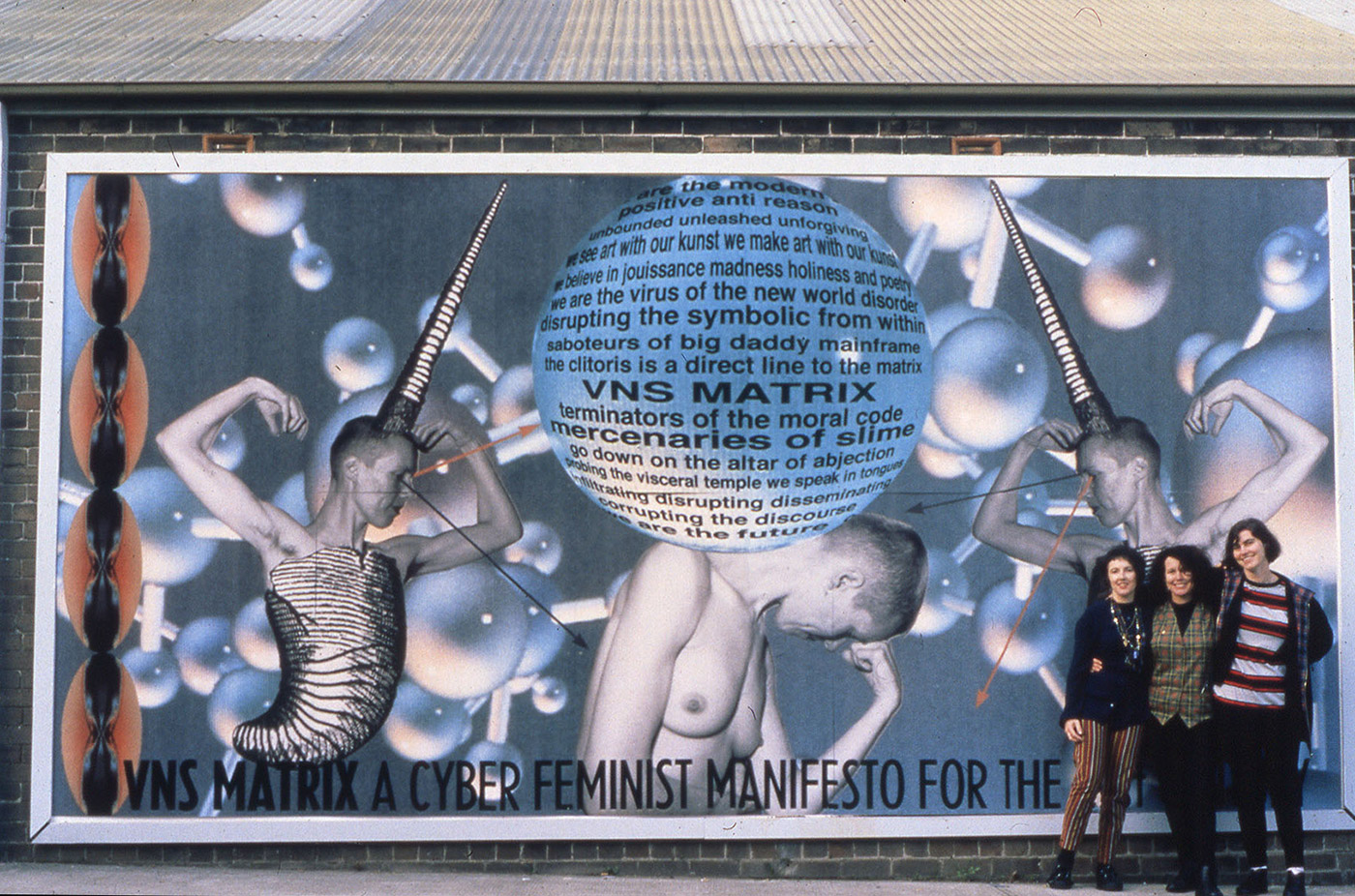 A billboard based on the manifesto shown on the side of Tin Sheds Gallery, Sydney, in 1992. Photo: VNS Matrix.
