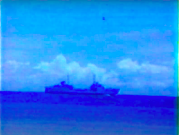 A blurry image of a large ship in the ocean.
