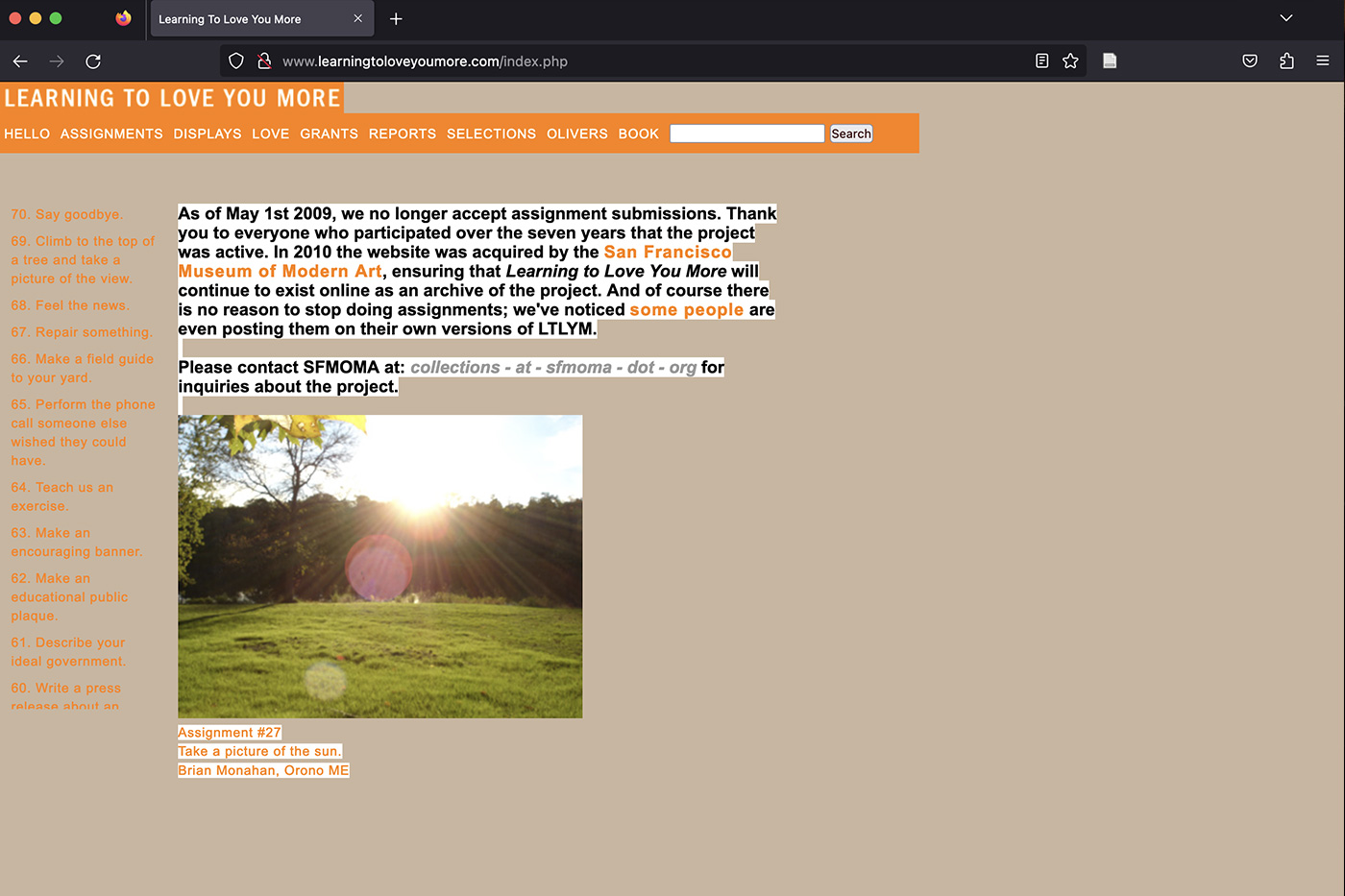 screenshot of the homepage of a website with a central picture of a green landscape